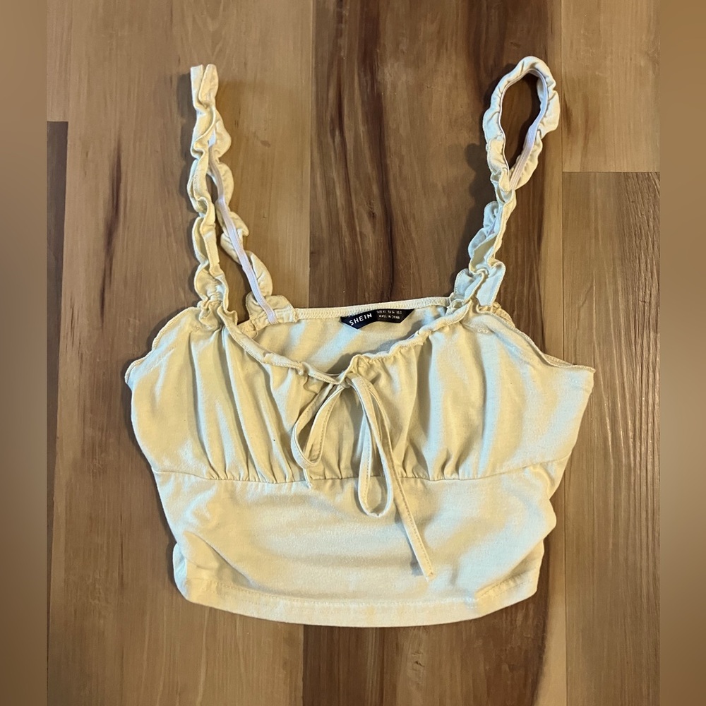 Cute light yellow cropped tank top from Shein, still in great condition!